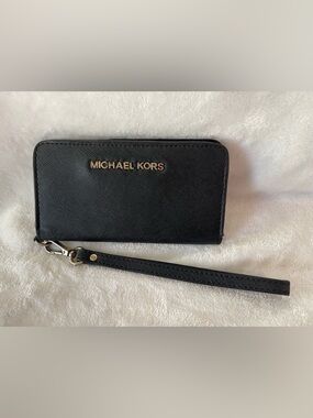 Black Michael Kors wristlet Jet Set Travel multifunction phone wallet